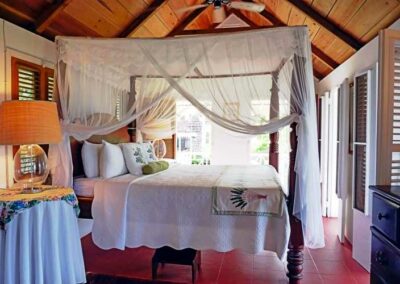 Four poster bed with pillows